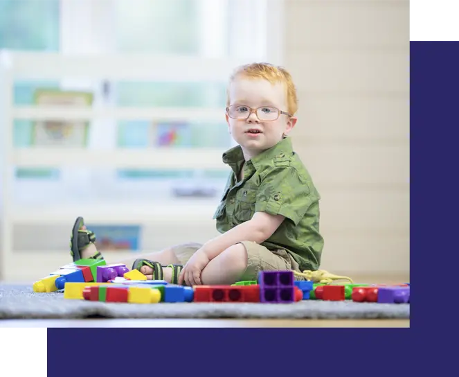 Toddler playing with blocks