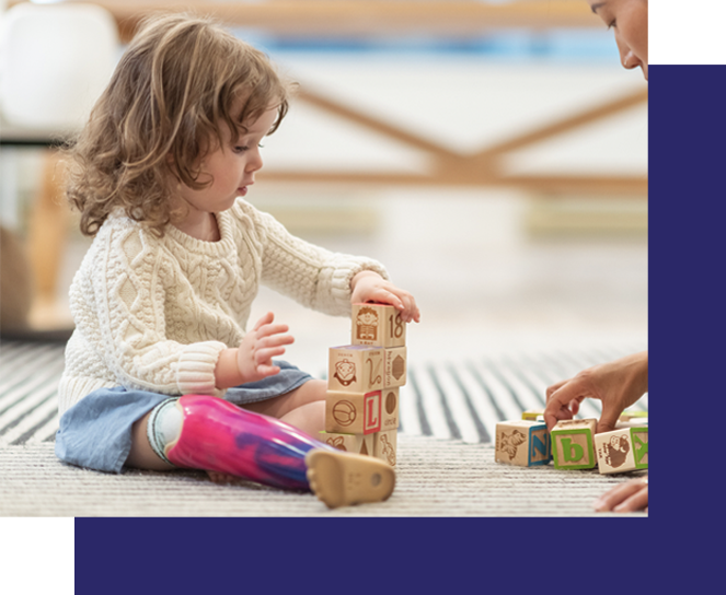 little girl playing with blocks